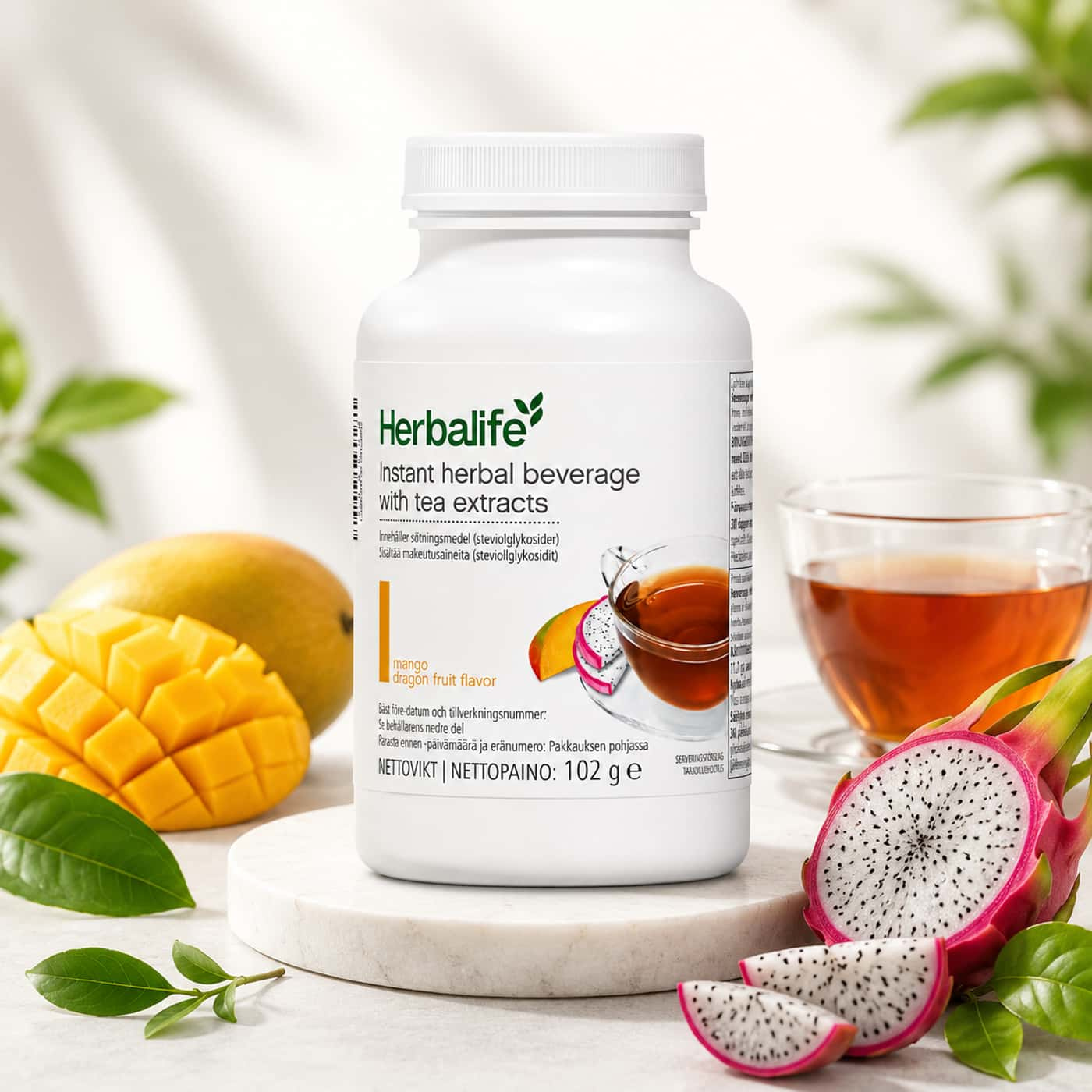 Herbalife Mango Dragonfruit örtdryck med mango, dragon fruit och gröna blad